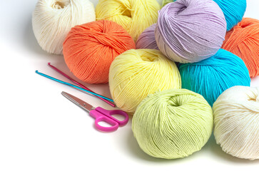 Colorful yarn balls isolated on white
