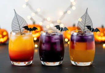 Three halloween themed cocktails isolated on white background