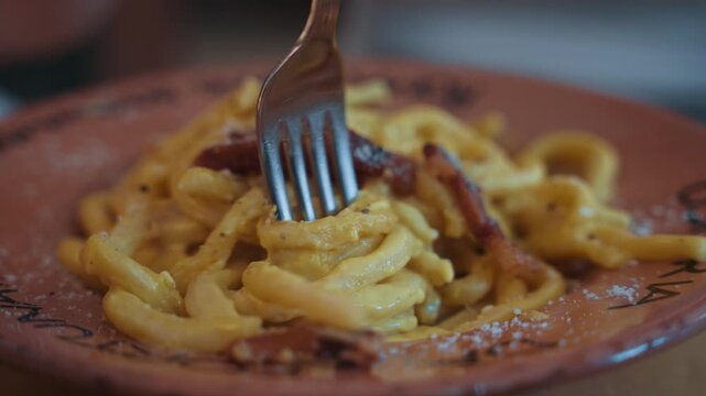 Authentic Italian carbonara pasta in ceramic plate