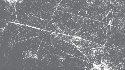 Detailed close up of a distressed grey textured surface with white scratches and speckles creating a grunge effect