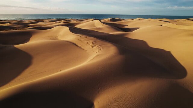 Mesmerizing sand dunes meeting the sea at Gran Canaria