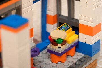 Naklejka premium Colorful toy kitchen scene with fun food items and accessories