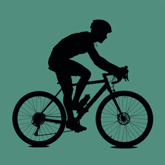 Obraz premium Silhouette of a cyclist in motion on a bicycle with a helmet.