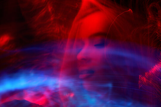 Surreal portrait with red and blue long exposure
