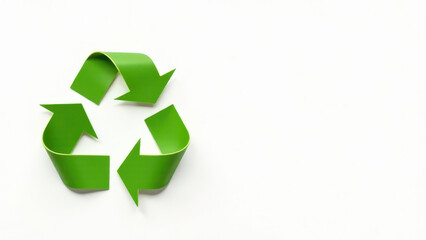 A vibrant green recycling symbol made of arrows is prominently displayed on a clean white background, emphasizing sustainability and environmental awareness in design and branding