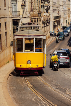Lisbon tram 28 winding through historic city streets