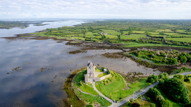 Aerial view of Dunguaire Castle by the water in Ireland