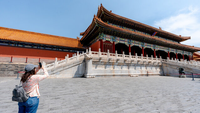 Tourist capturing the forbidden city architecture