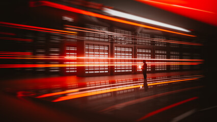 Technician works with laptop in modern data center environment