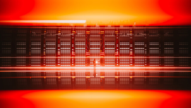 Technician works with laptop in modern data center environment