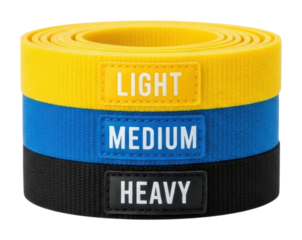 Strength training accessories resistance bands in vibrant colors isolated on transparent background