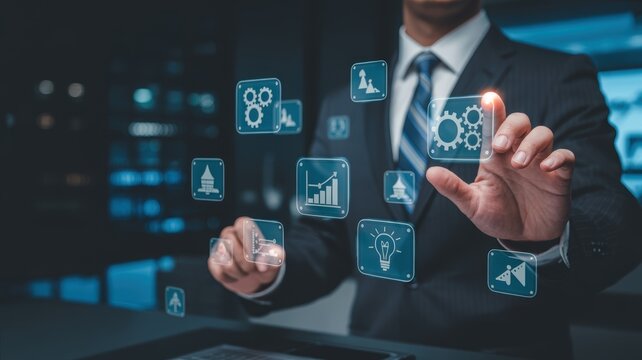 Businessman interacting with virtual screen displaying business process icons in a modern office.
