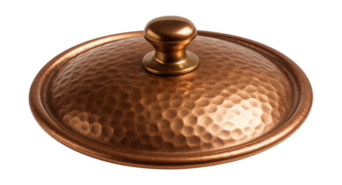 Hammered copper lid adds style and function to a saucepan for home dining.