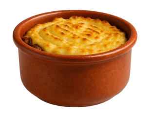 A rustic terracotta ramekin, perfect for individual servings of shepherd's pie.