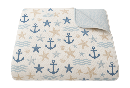 Reversible quilted bedspread with a nautical design, perfect for a coastal getaway bedroom.
