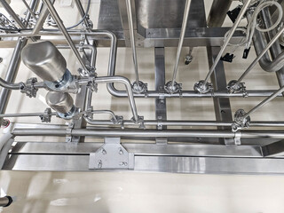 Stainless steel pipes and valves in an industrial setting