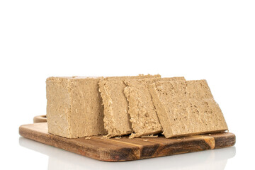 Fragrant sweet halva isolated on white background, macro.