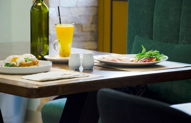 Delicious Caf&eacute; Breakfast with Fresh Juice and Eggs