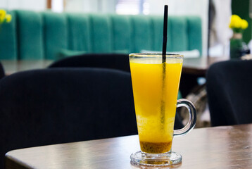 Fresh Orange Drink in a Caf&eacute; Setting