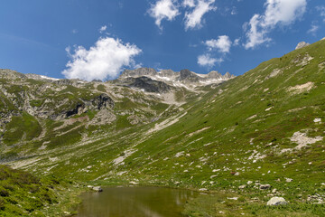 Beautiful view on alpine lake in the Lauzière massif , Savoie , France 