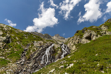 View on a waterfall in the Lauzière massif , Savoie , France 