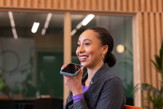Woman using a virtual assistant on her phone