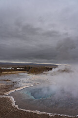 Exploring the Geysir Geothermal Area, where bubbling earth and erupting steam reveal Iceland’s untamed energy