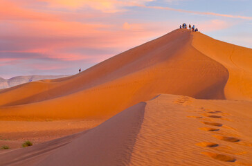 sahara sunset over golden dunes, morocco