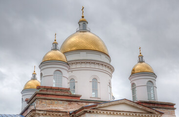 Domes of a Christian church undergoing restoration. Borovichi, Russia.
