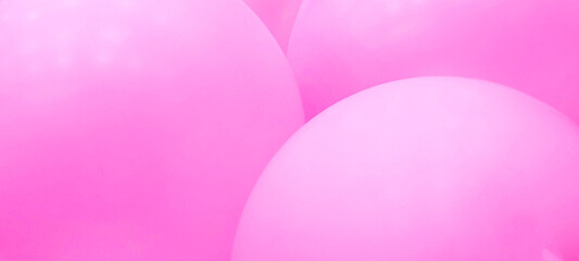 Bright pink balloons as background. Celebration concept.