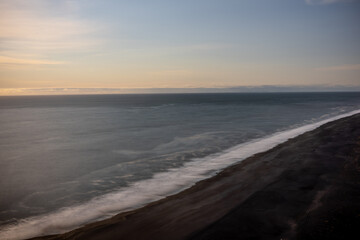 Perched above roaring waves and endless black sands, Dyrhólaey reveals Iceland’s raw beauty.