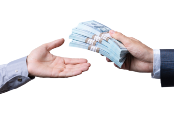 Money exchange occurs between two hands during a financial transaction in a business setting