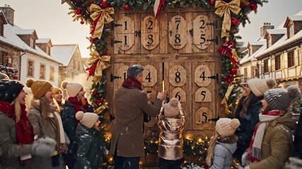 A joyful crowd gathers around a giant wooden advent calendar in a snowy village. This festive scene evokes community, tradition, and holiday magic. Ideal for seasonal greetings or promotions.