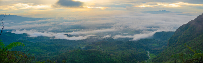 Fototapeta premium a panoramic view of a lush, forested mountain landscape. Galunggung, Tasikmalaya, Indonesia