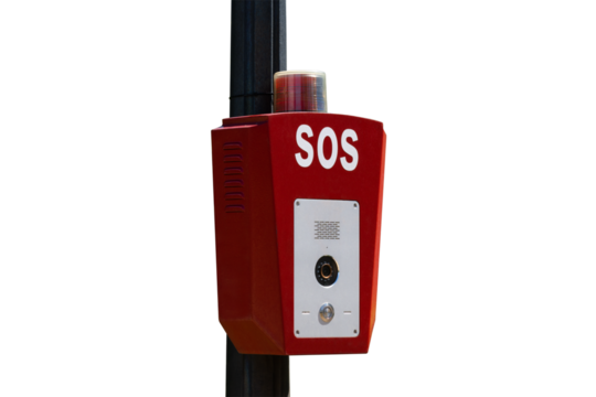 Bright red emergency SOS phone station with an alert light on top