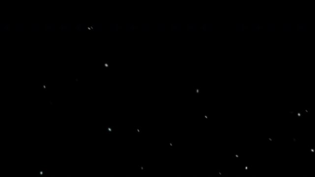 Animated video simulating snowflakes falling on a black background. Ideal for overlay and composition.
