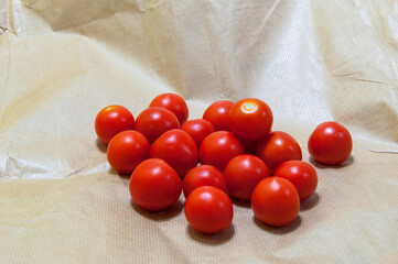 Eco Packaging: Red Tomatoes on Crumpled Kraft Paper