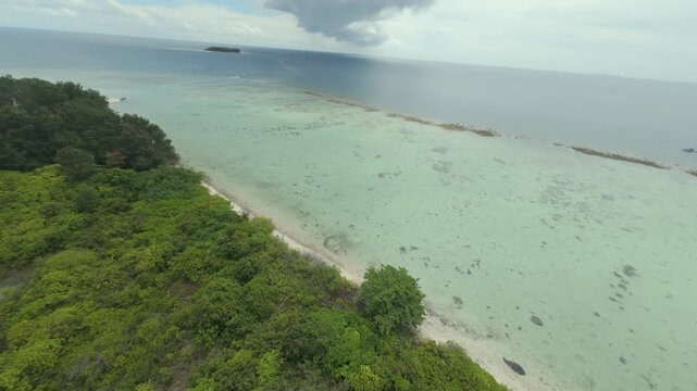 Dynamic FPV Drone Shot Soaring Over Pristine Tropical Beaches and Island Scenery of Karimunjawa
