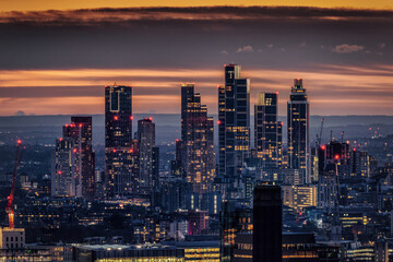 Elevated view of the skyline at Nine Elms district, West London, England, with residential and office skyscrapers during dusk