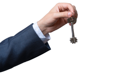 Hand holds out a key against a transparent background for symbolizing access and opportunity
