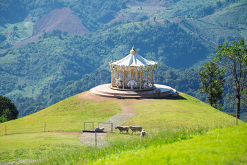kha Farmville, a new tourist attraction with a romantic toy carousel on the mountain, is the only sheep farm in Doi Chang, Chiang Rai Province, located on the top of the mountain