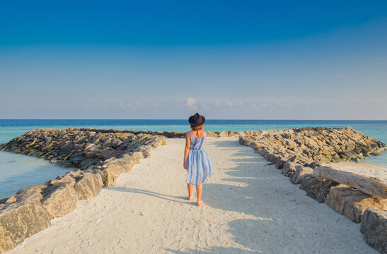 Maafushi Traveler. Beautiful natural landscape of colorful cloud sky and sun in Maafushi Island, Maldives