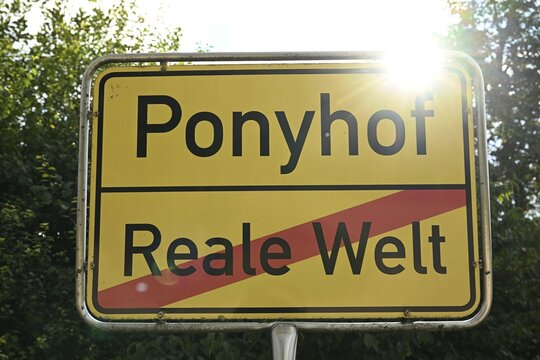 Pony farm versus real world sign, Baden-W&uuml;rttemberg, Germany