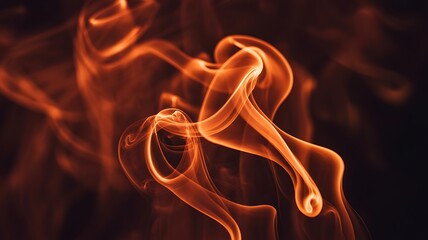 Abstract orange smoke swirls against dark background evoking warmth and mystery