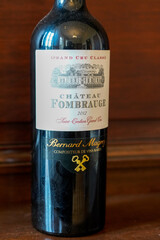 Fototapeta premium chateau fombrauge logo brand and text sign 2012 bottle of wine legendary grand cru classe of saint-emilion of bernard magrez owner of large international vineyards