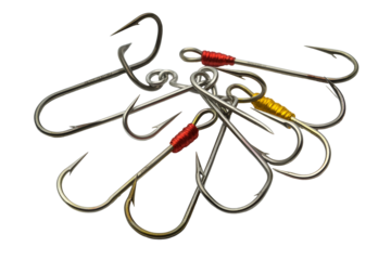 Pile of fishing hooks with red and yellow accents isolated on transparent background