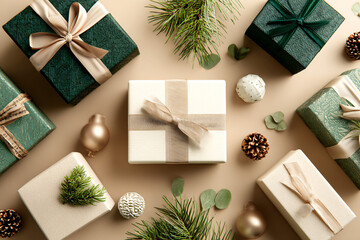Modern flat lay of wrapped gift boxes with simple ribbons, surrounded by pine branches and small geometric ornaments, clean studio lighting, warm beige and forest green colors