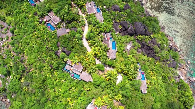 Seychelles paradie resort with swimming pools in the rainforest view from above