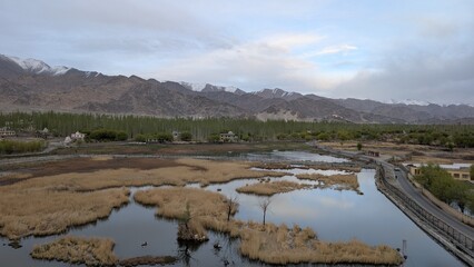 Shey Lake's clear water in the mountains and chill weather
