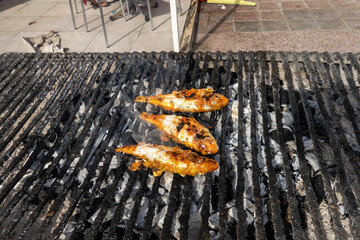 El Jem, Tunisia  Fish grilling on an outdoor grill in the souk or Medina.